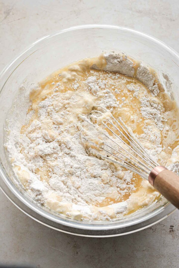 Step 2 for making vanilla cupcake batter - mixing wet and dry ingredients.