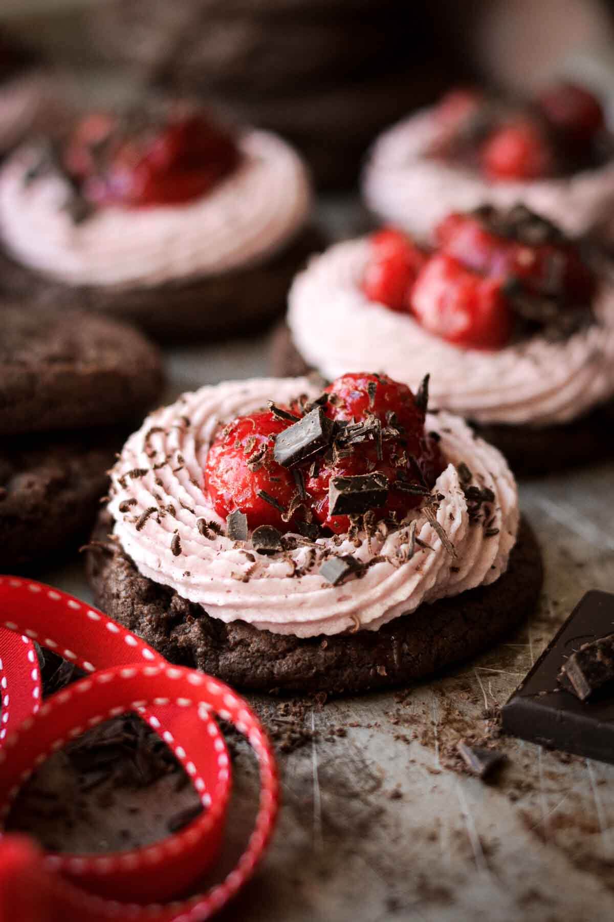 Chocolate cherry cookie, sprinkled with chopped chocolate.