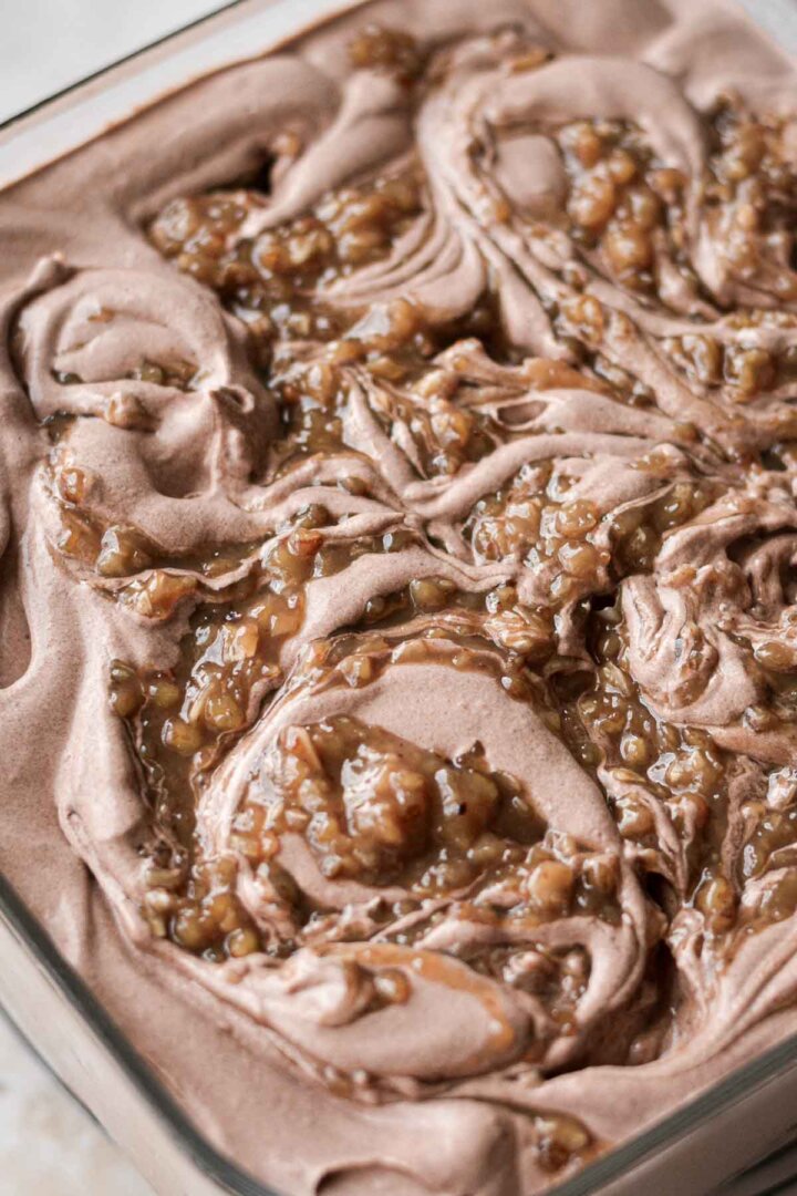 Coconut caramel frosting swirled into chocolate ice cream.