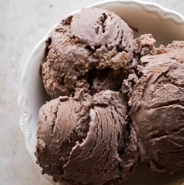 Scoops of German chocolate cake ice cream in a bowl.