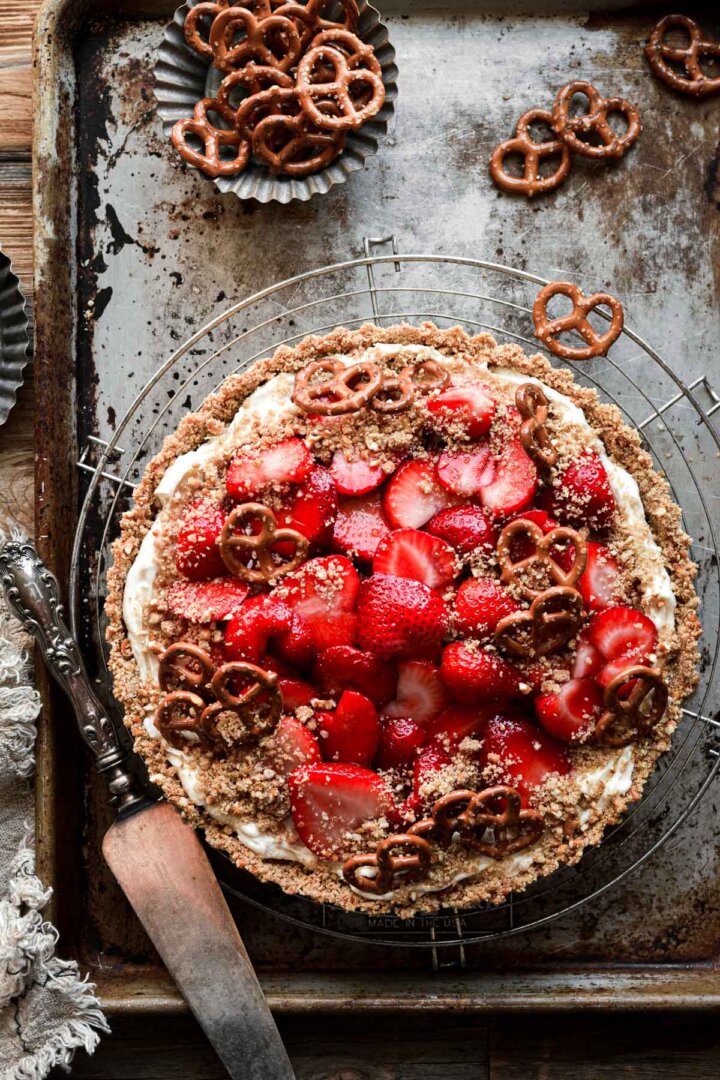 Strawberry pretzel pie, surrounded by mini pretzel twists.