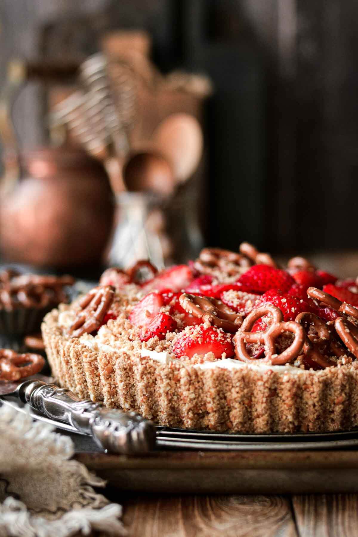 Strawberry pretzel pie on a cooling rack.