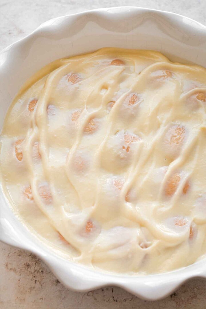 Step 2 for making strawberry pudding - vanilla custard layer.
