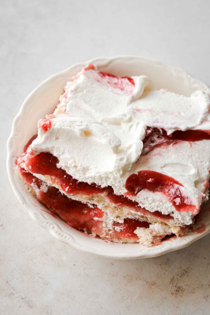 Layered strawberry pudding in a bowl.