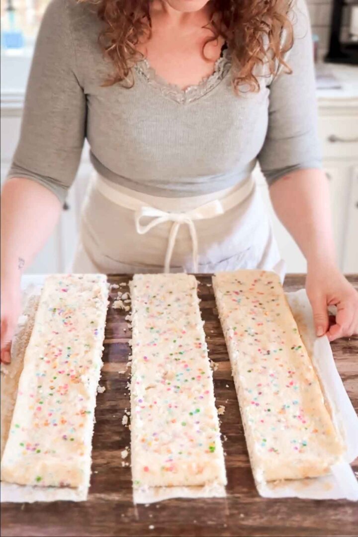 Step 3 for assembling a table runner cake - separating the three sections of cake.