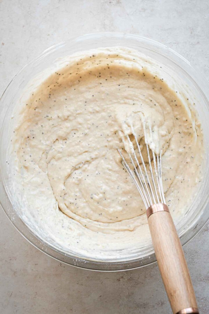 Step 3 for making almond poppy seed muffins - bowl of muffin batter.