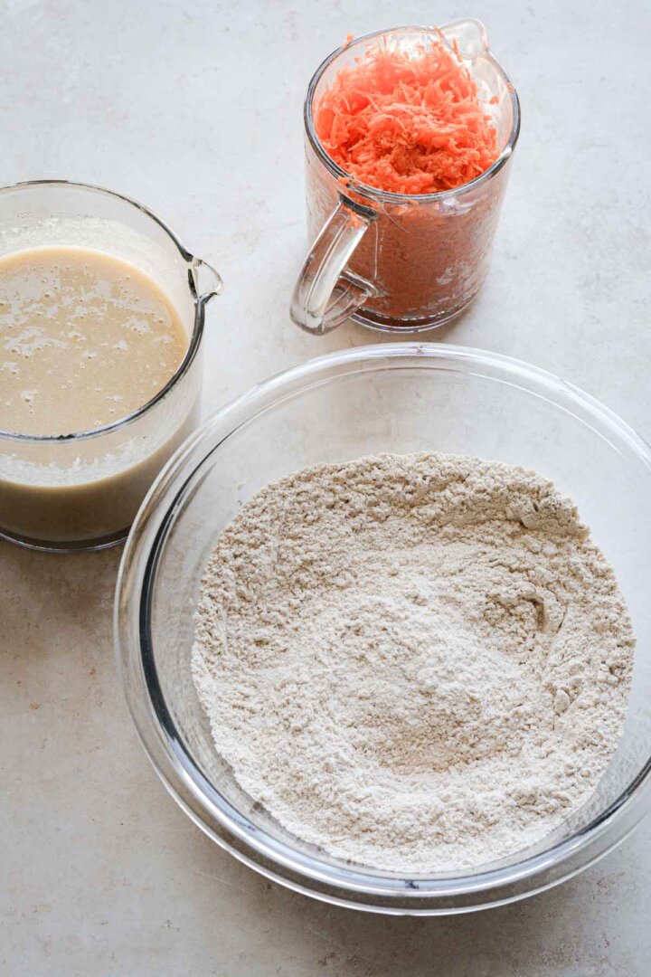 Step 2 for making carrot cake muffins - mixing wet and dry ingredients.