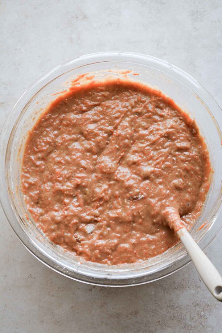 Step 4 for making carrot cake muffins - mixed batter.