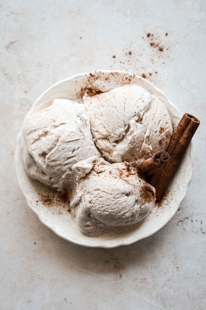 Scoops of cinnamon ice cream in a bowl.