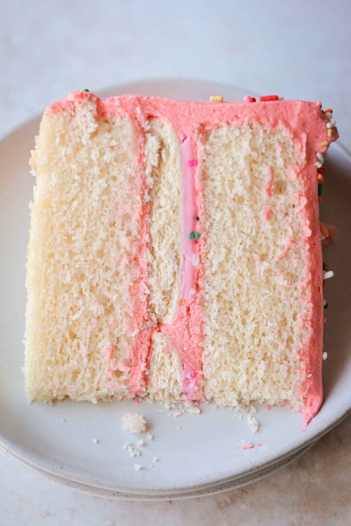 Slice of sugar cookie sprinkle cake.