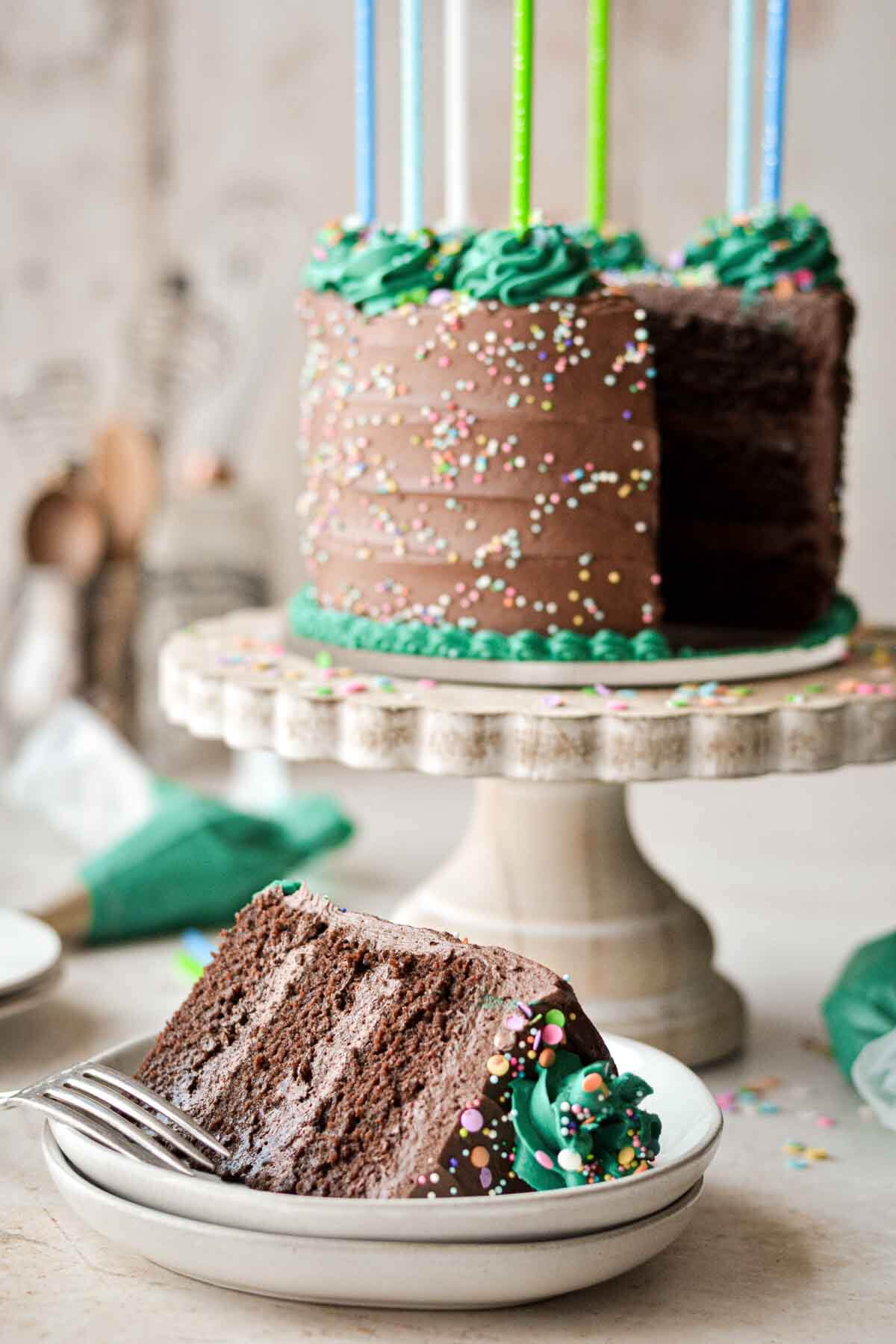 Slice of gluten free chocolate birthday cake.