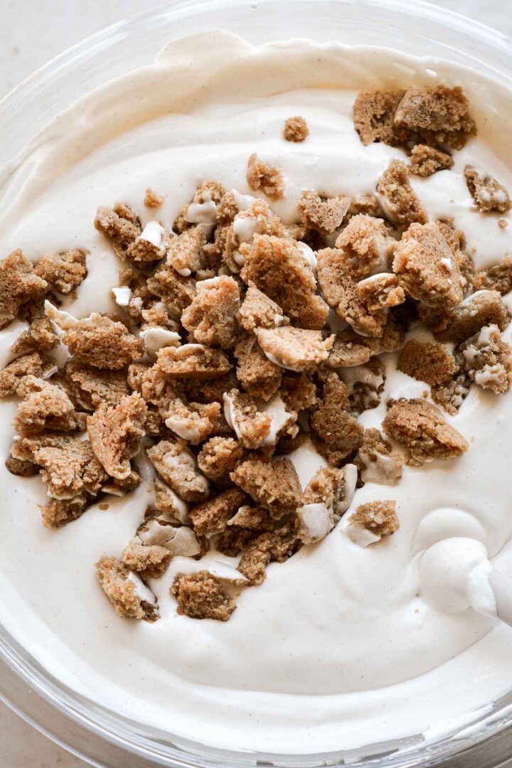 Step 3 for making oatmeal cookie ice cream - adding crumbled cookies.