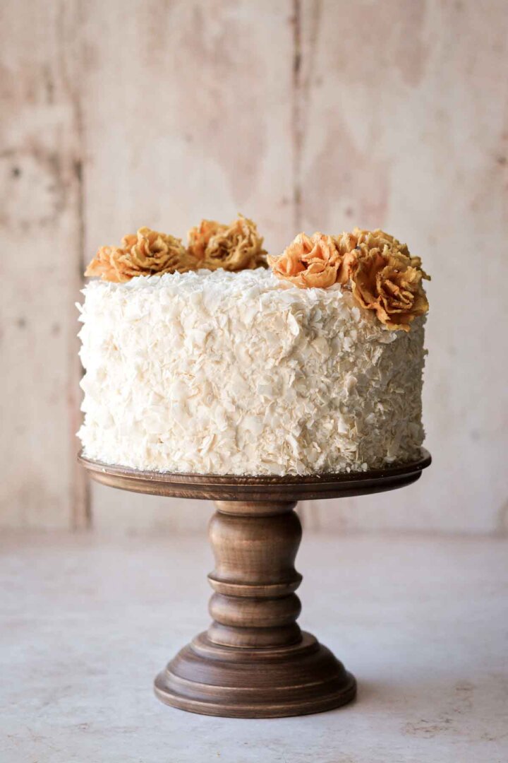 Step 4 for assembling a pineapple coconut cake.