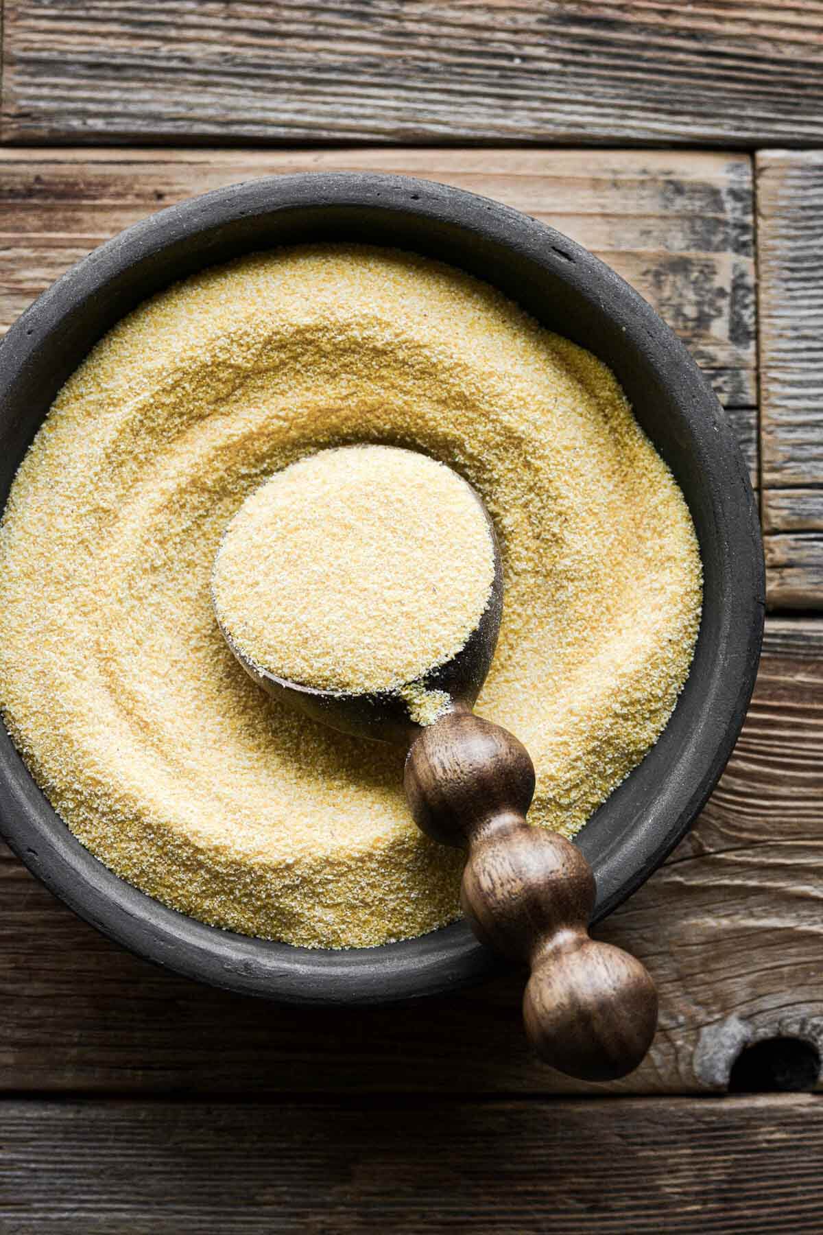 Bowl of yellow cornmeal.