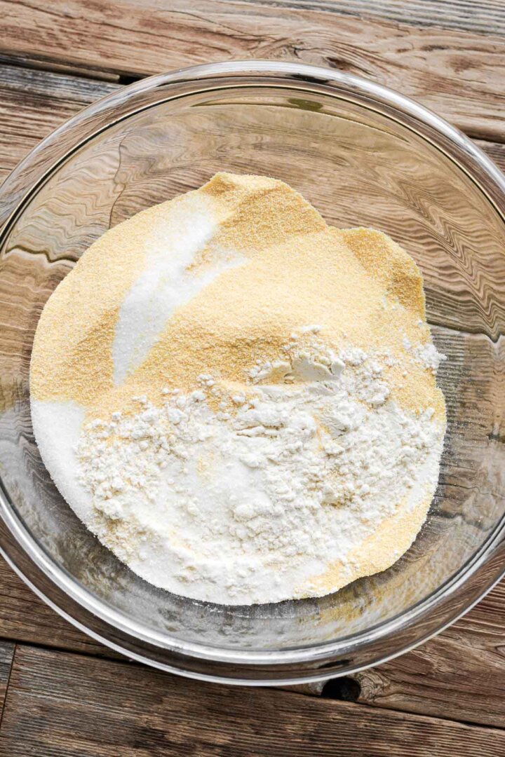 Step 1 for making corn bread - mixing dry ingredients.