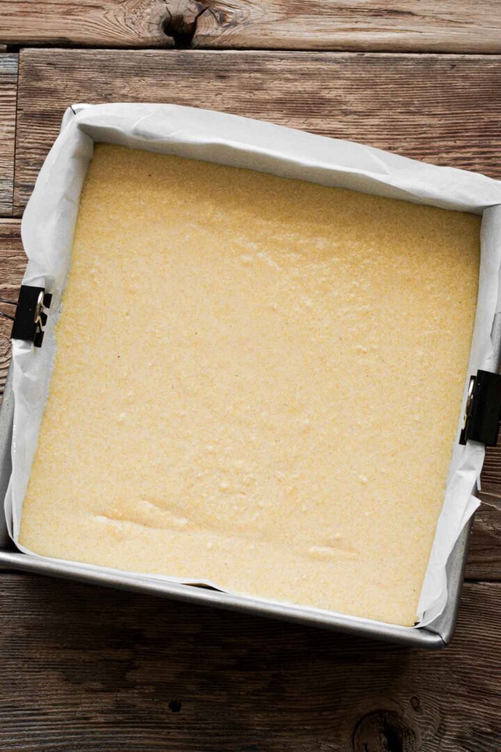 Step 3 for making corn bread - batter in a pan.