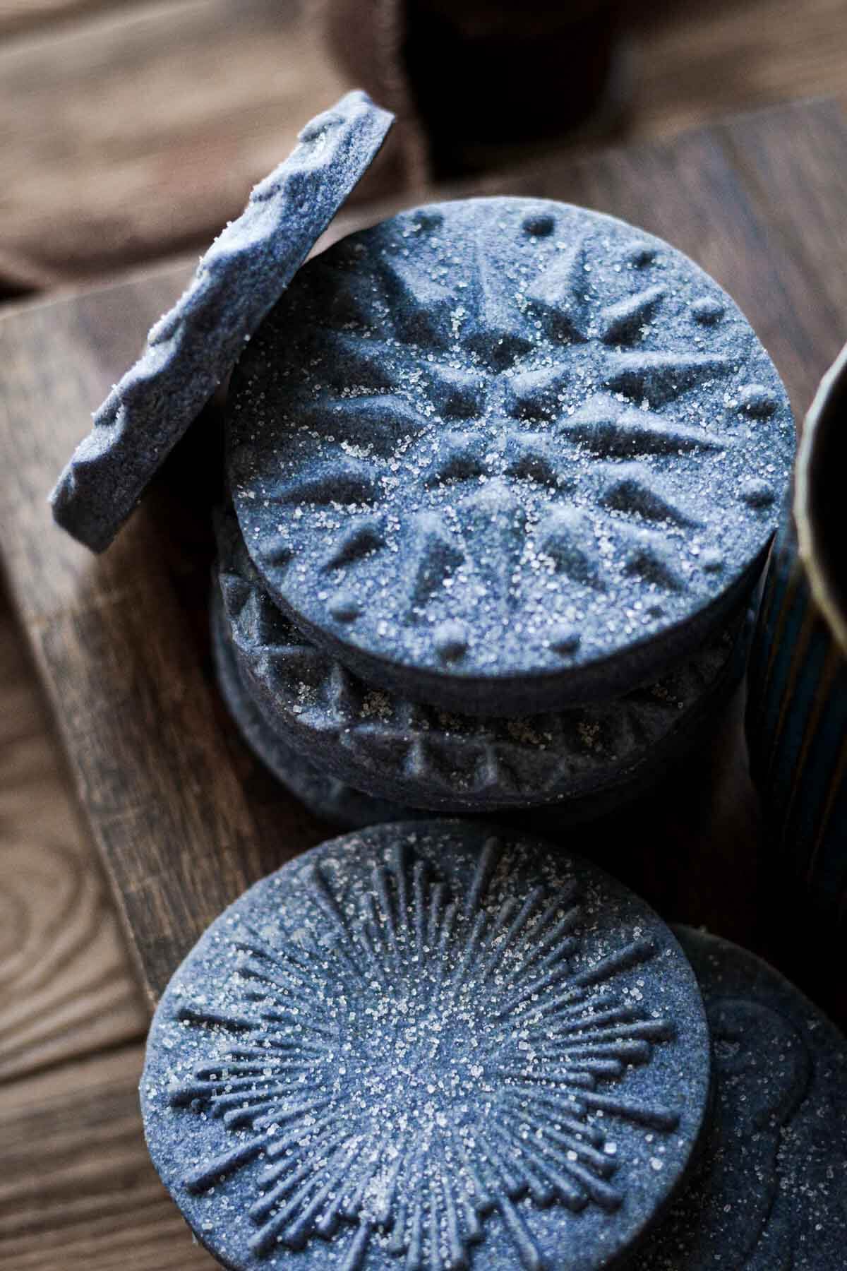 Blue shortbread cookies, pressed with cookie stamps.