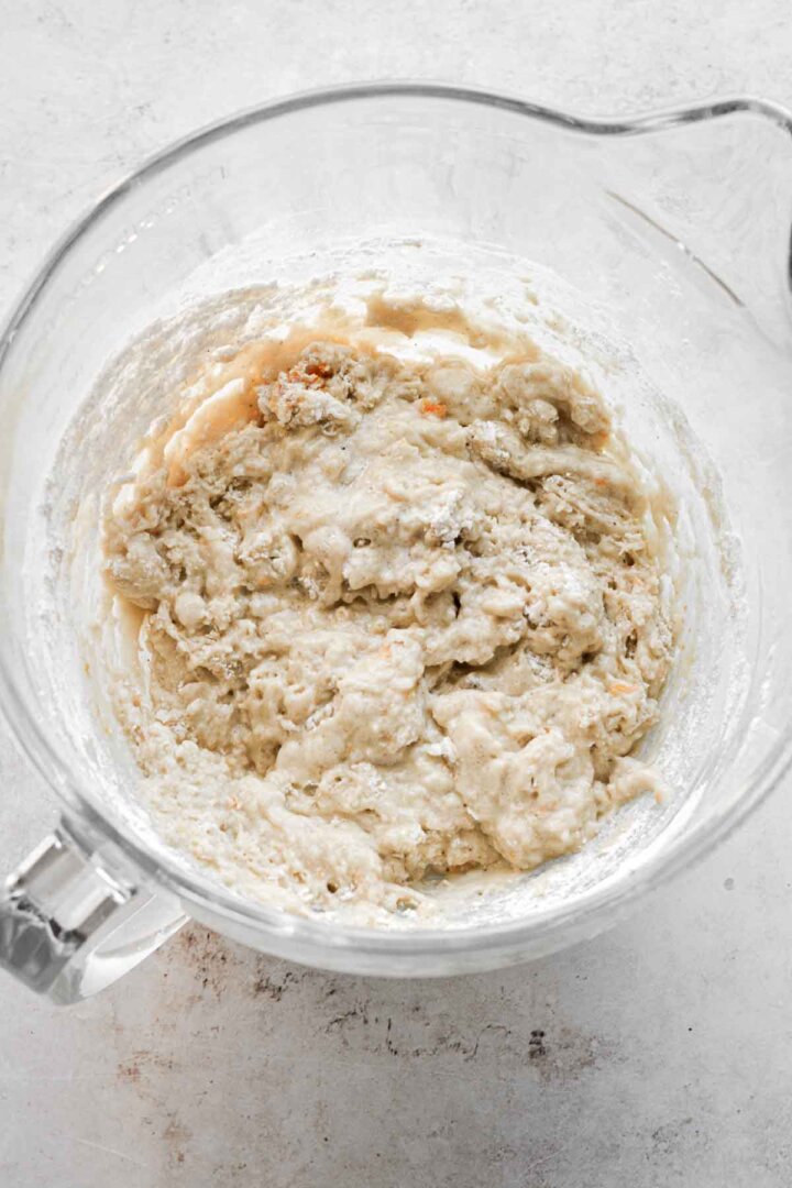 Mixing cinnamon roll dough.