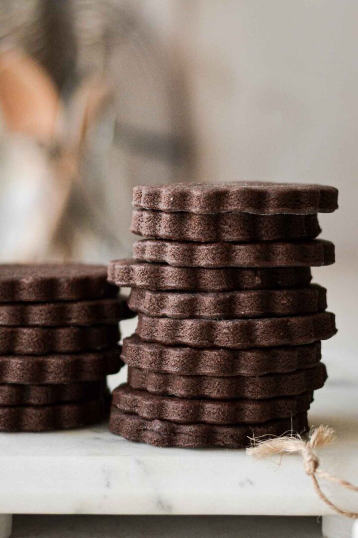 Stack of chocolate cutout cookies.