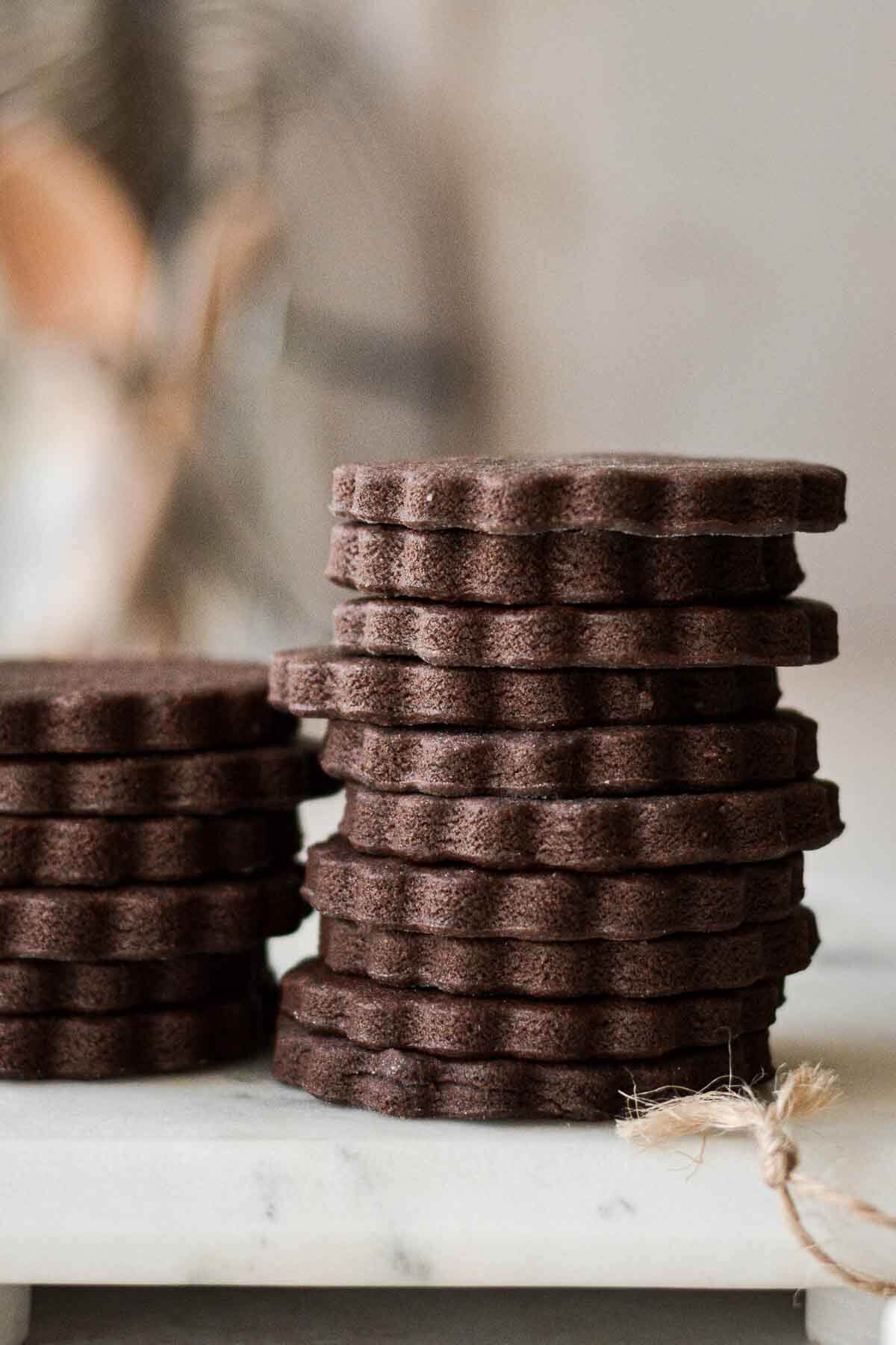 Stack of chocolate cutout cookies.