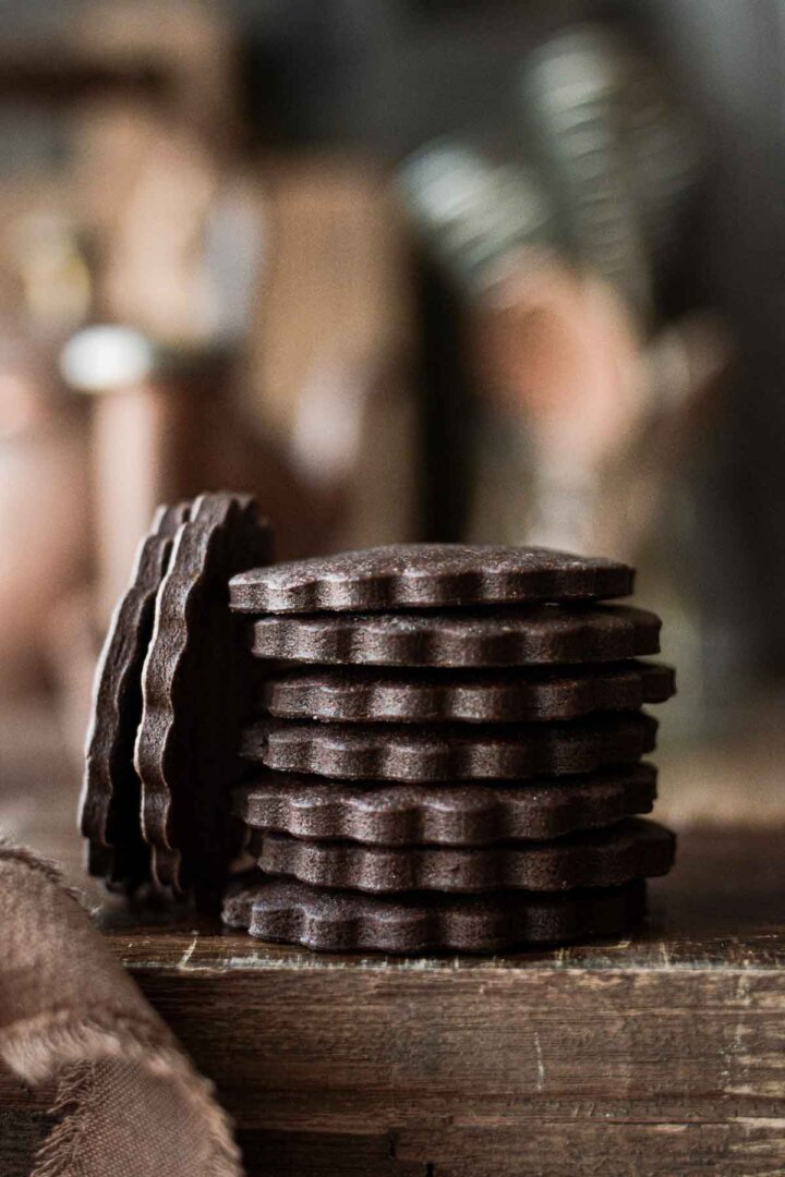 Stack of chocolate cutout cookies.