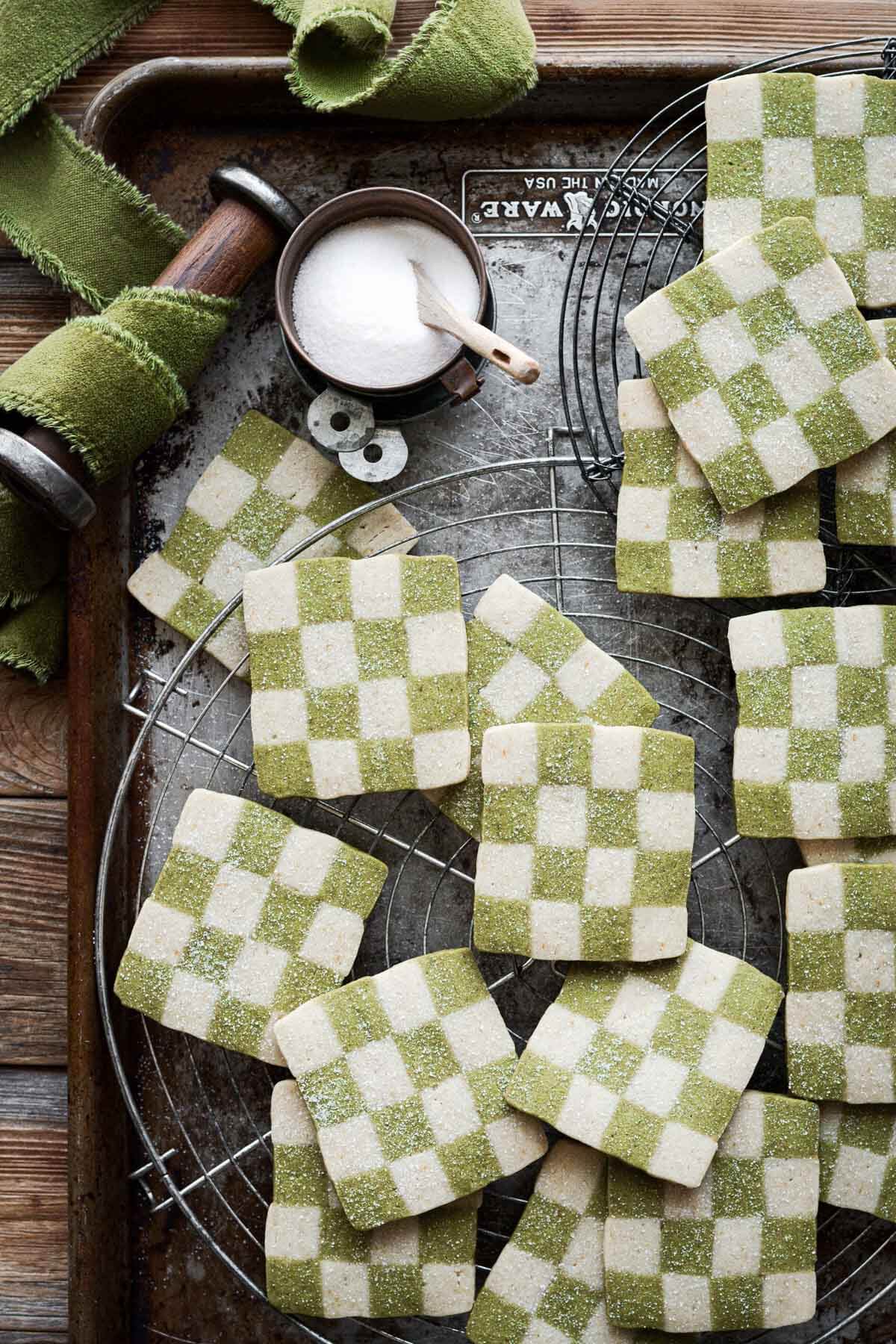 Green and white checkerboard shortbread cookies, with green ribbon.