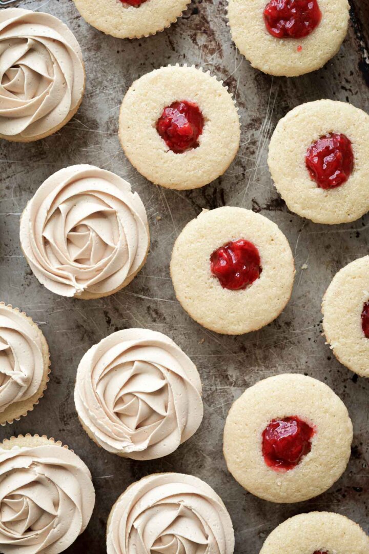 Vanilla cupcakes, filled with strawberry compote, frosted with peanut butter buttercream.