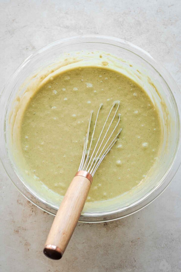 Step 4 for making matcha cake - whisking the batter.