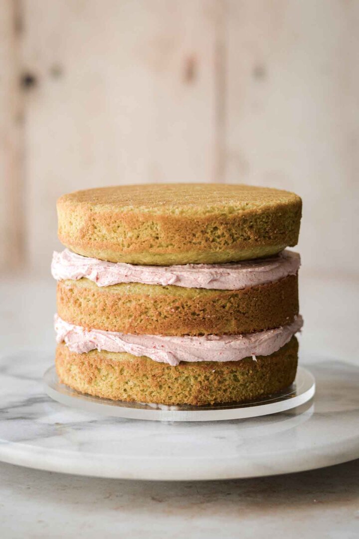 Matcha cakes layered with strawberry buttercream.