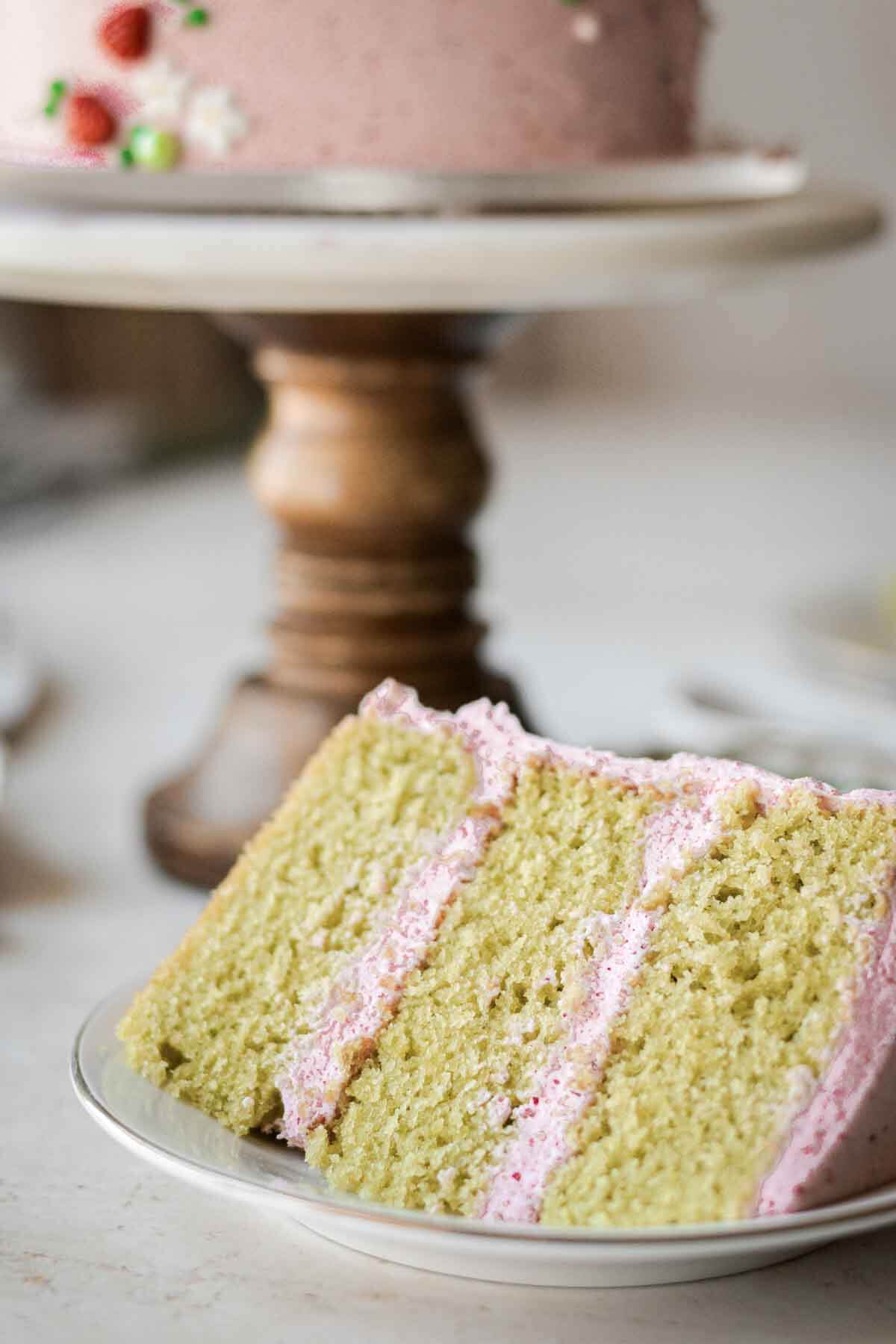 Slice of strawberry matcha cake.