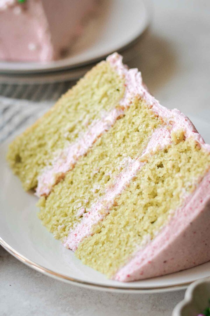Slice of strawberry matcha cake.