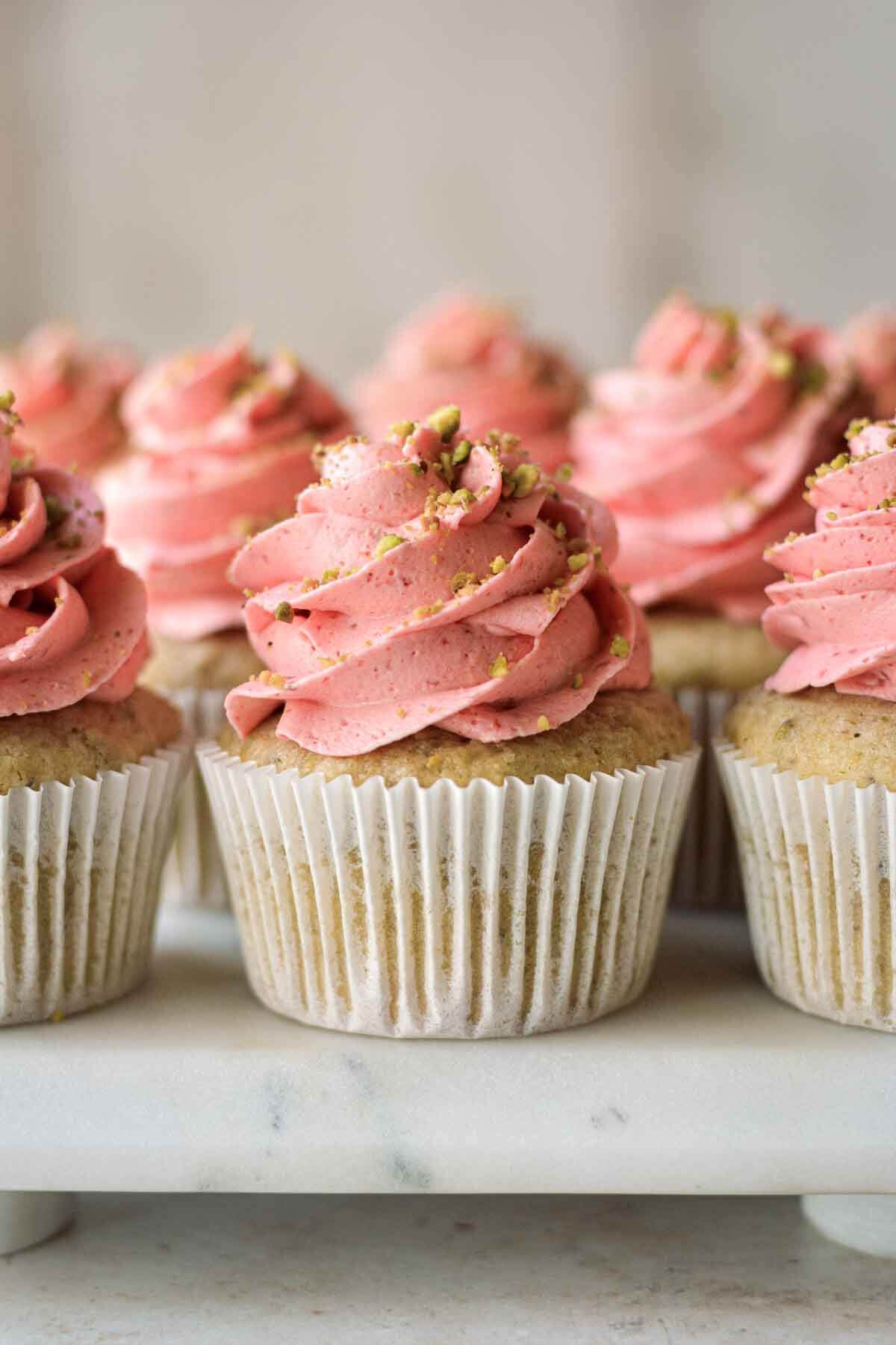 Strawberry pistachio cupcakes.
