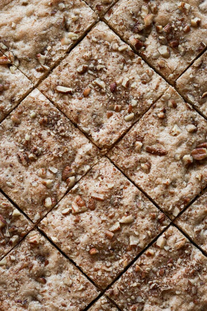 Butter pecan blondies cut into squares.