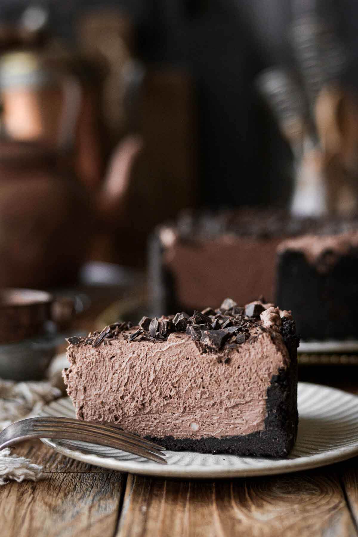 A slice of no bake chocolate cheesecake.