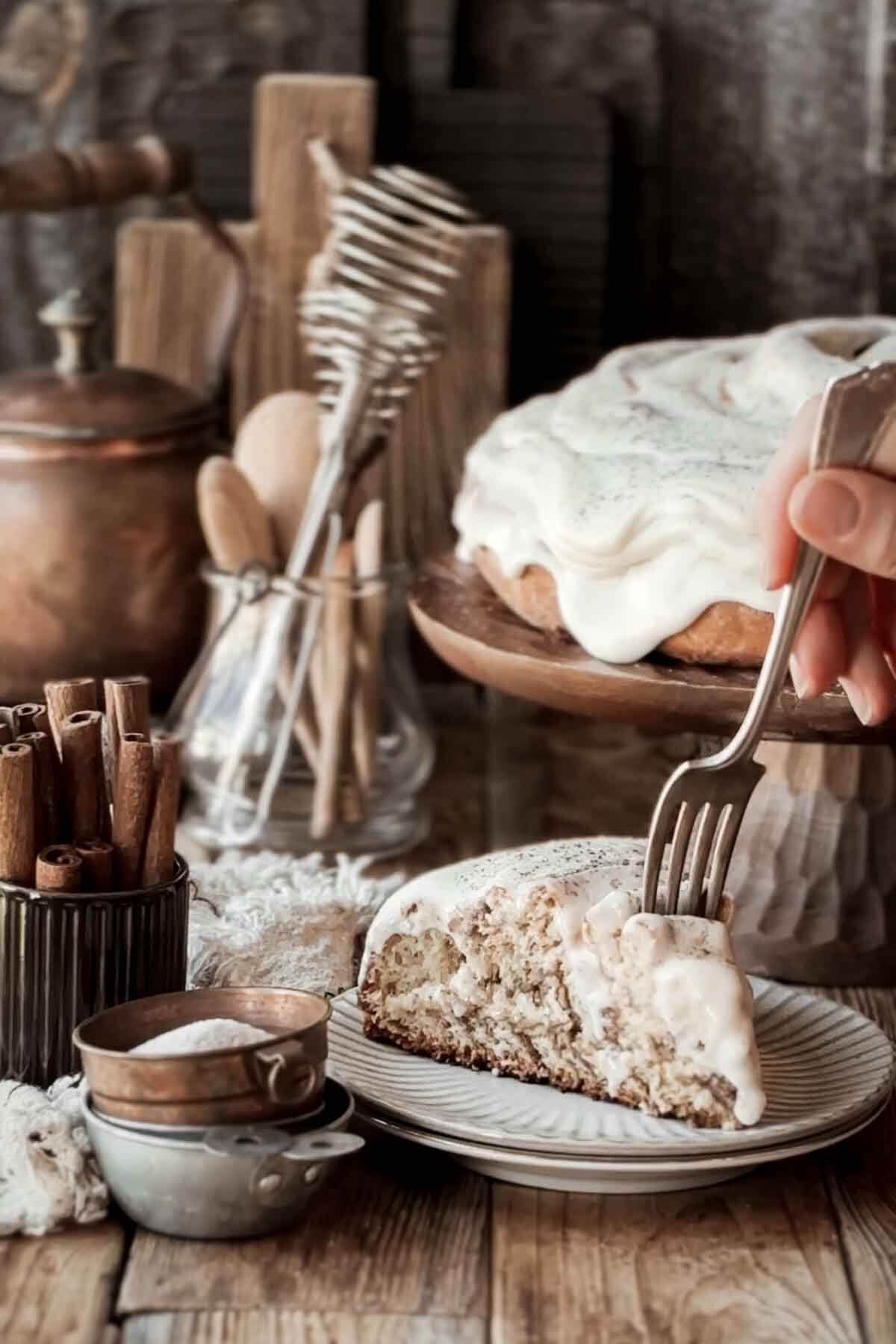 Slice of cinnamon roll cake.