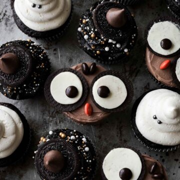 Halloween cupcakes, including owls, ghosts, and witch hats.