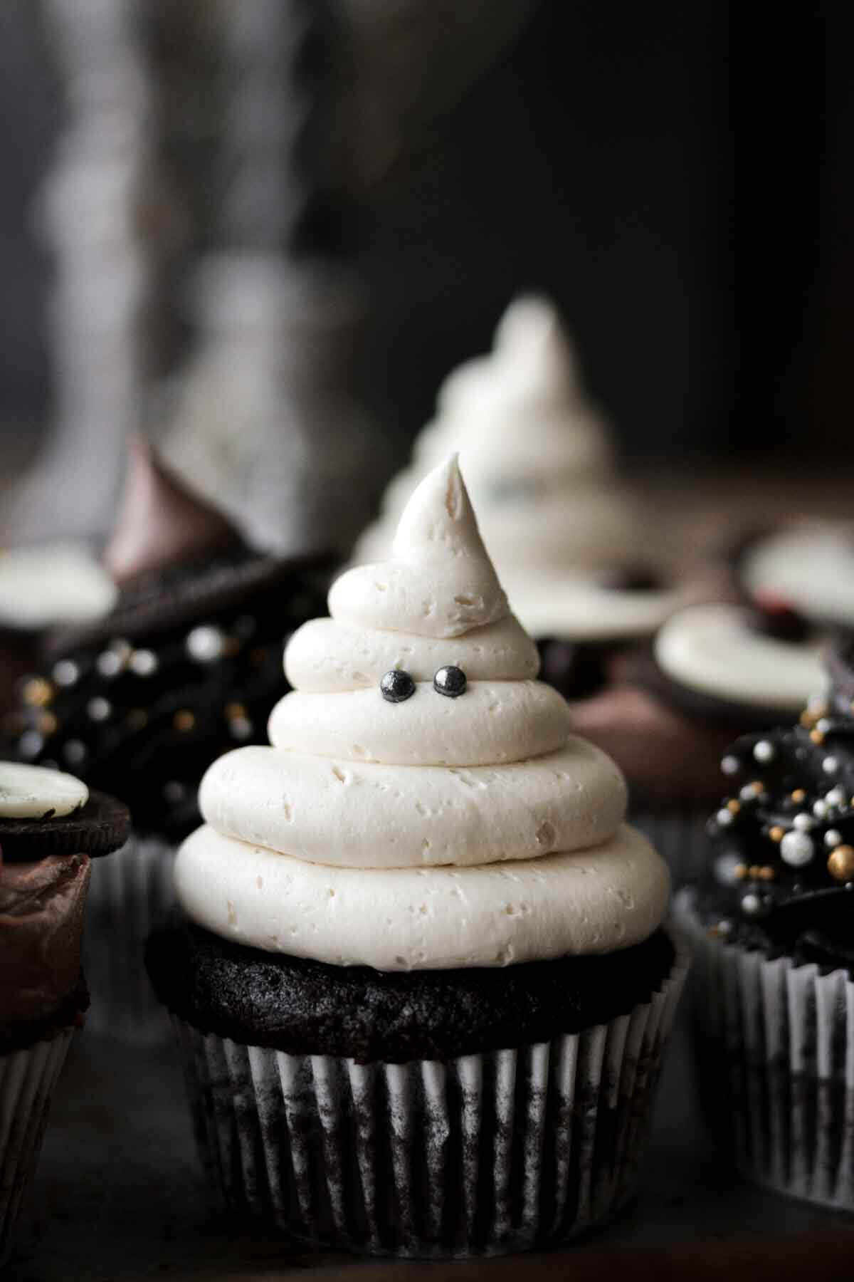 Ghost cupcake with sugar pearl eyes.