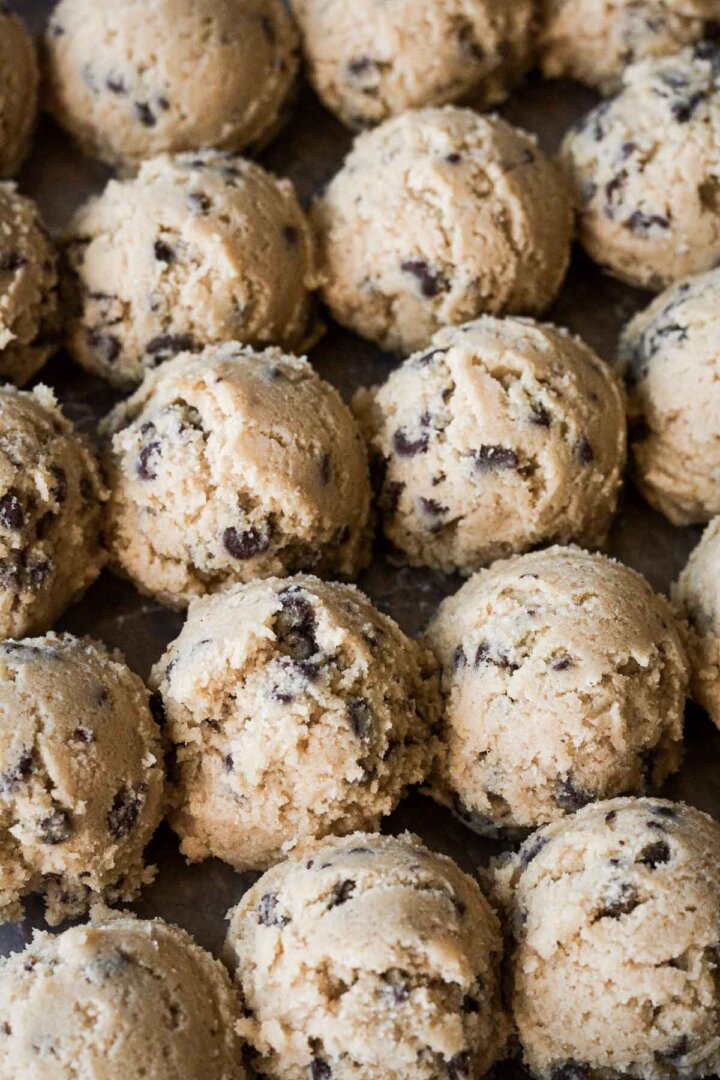 Balls of chocolate chip cookie dough.