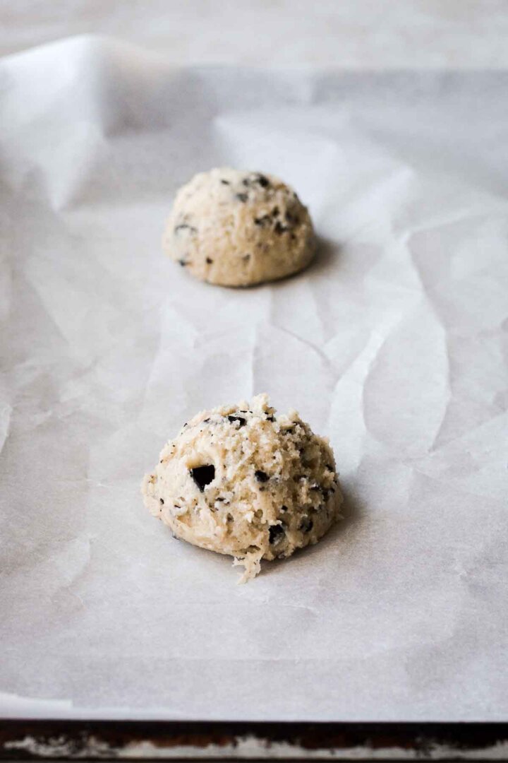 Step 4 for making chocolate chip cookies - scooped into balls.