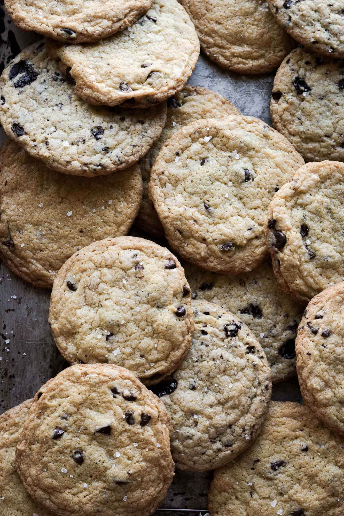 Thin and crispy chocolate chip cookies sprinkled with salt.