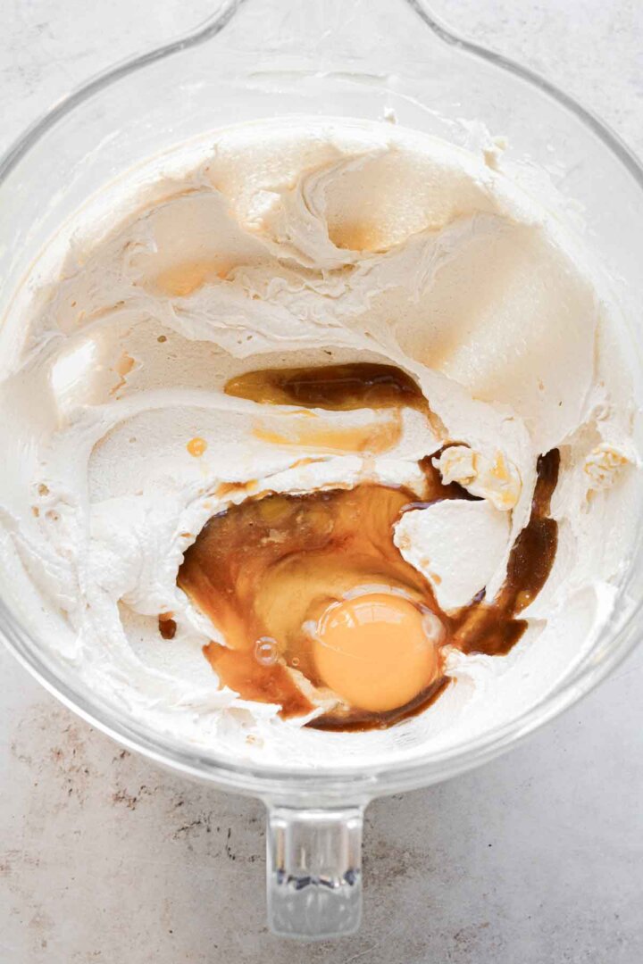 Step 3 for making bakery chocolate ship cookies - adding egg and vanilla.