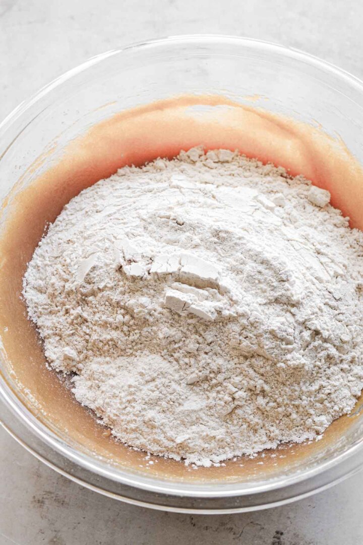 Step 4 for making peanut butter cookies - adding dry ingredients.