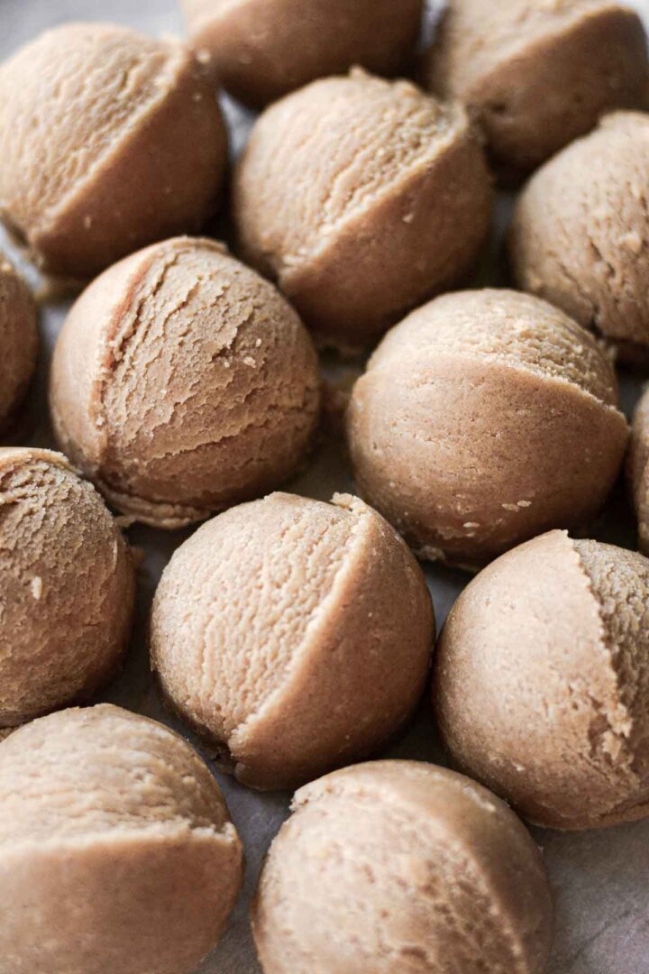 Step 6 for making peanut butter cookies - dough scooped into balls.