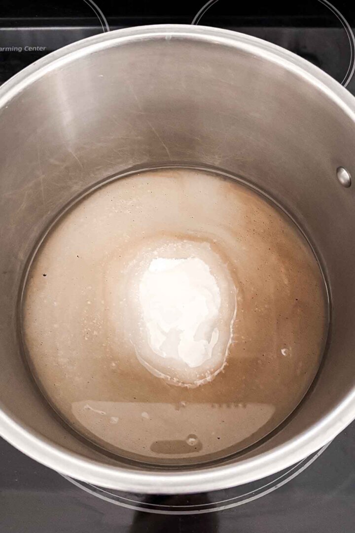 Step 1 for making peanut brittle - combining the sugar and corn syrup.