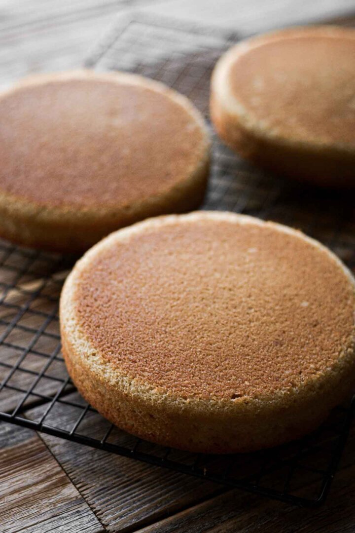 Step 7 for making cashew cake - cakes on a cooling rack.