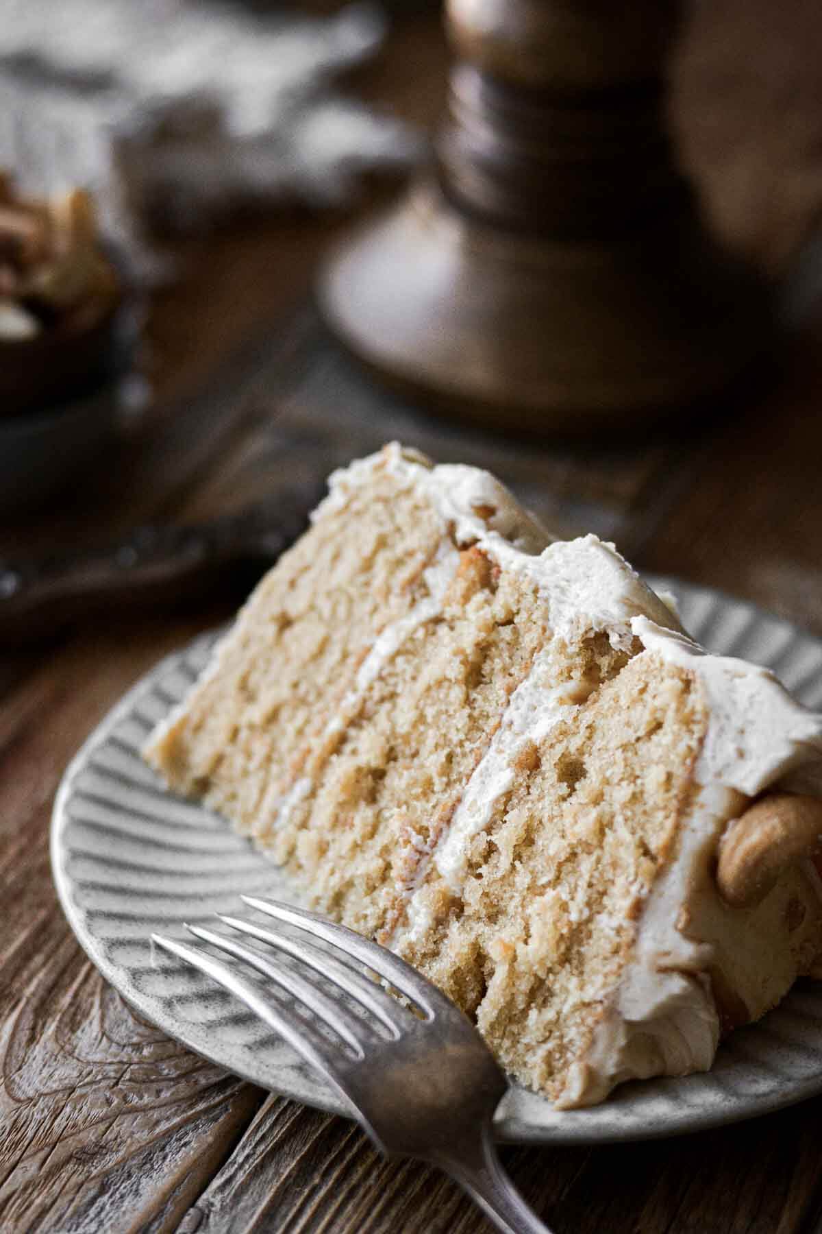 Slice of caramel cashew cake.
